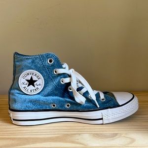 Size 7 women’s Converse All Star High Tops.